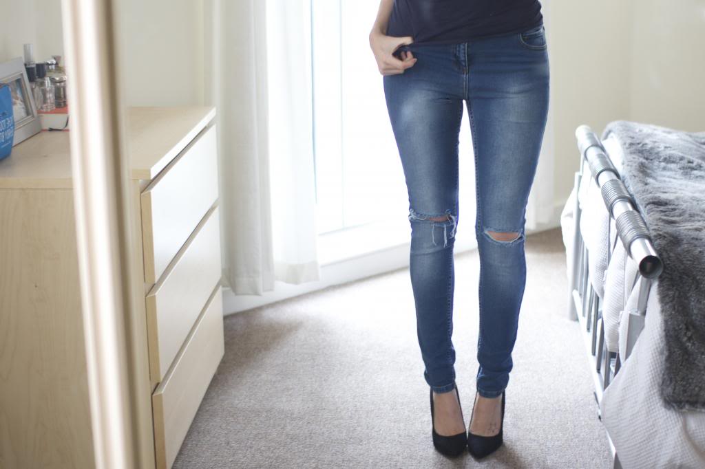 one knee cut jeans